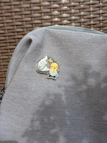 Thumbs up bird pin