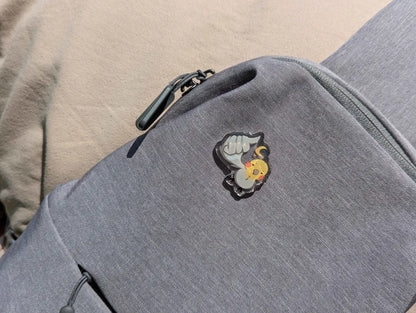 Thumbs up bird pin